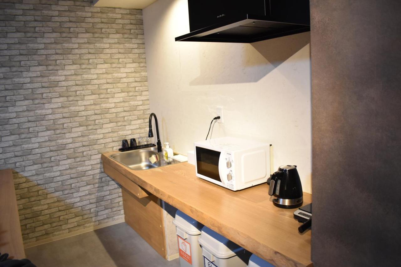 Shinsaibashi House Hotel Osaka Bagian luar foto